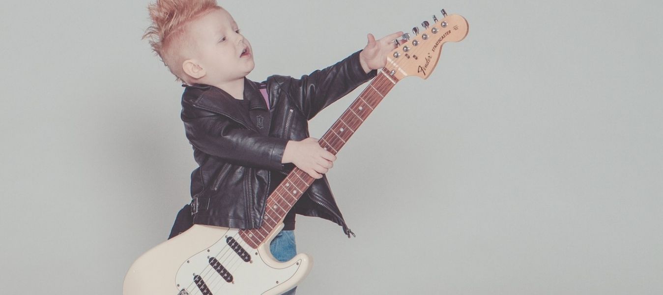 child playing guitar